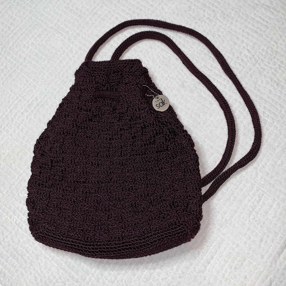 The Sak Crochet Backpack Drawstring Bucket Bag, Chocolate Brown with Purple Hue